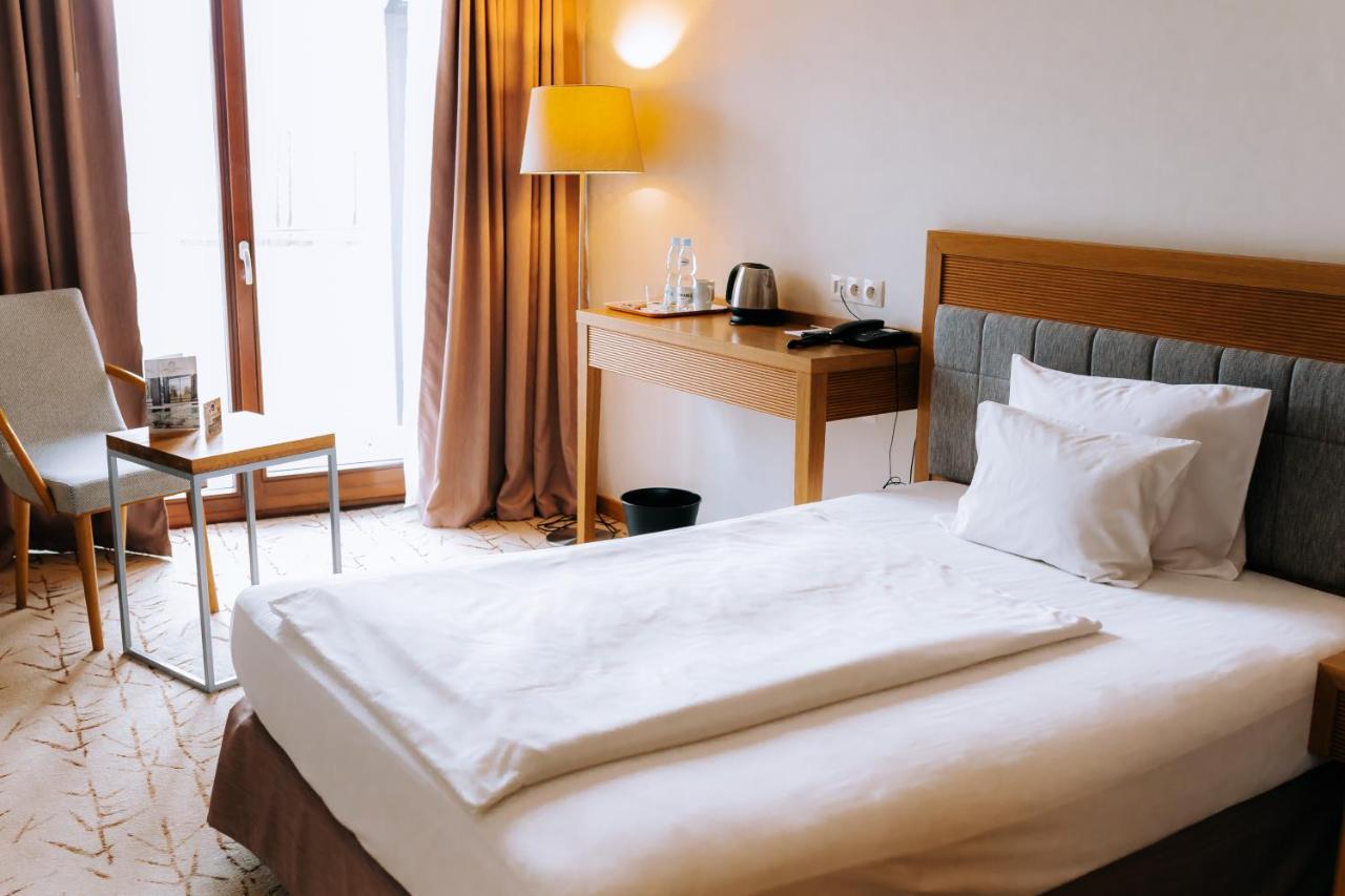 Hotel Marina Club أولشتين المظهر الخارجي الصورة A hotel room